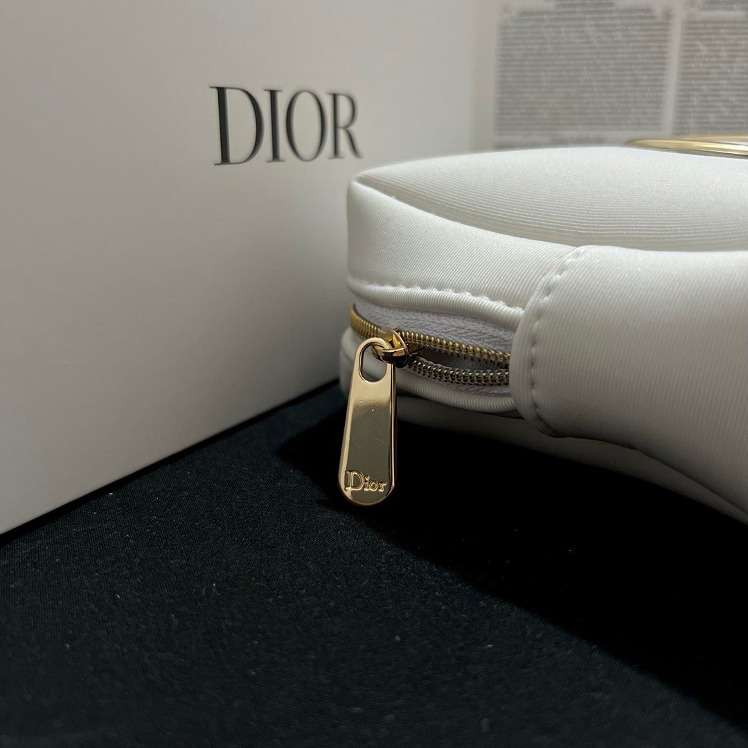 AUTHENTIC DIOR POUCH BAG (Category: Luxury Bags & Wallets) located in Rizal. Submitted by thetopspotfashionboutique (Listing ID 1266244295, Image 2). Description: - with box - complimentary gift from Dior Beauty.