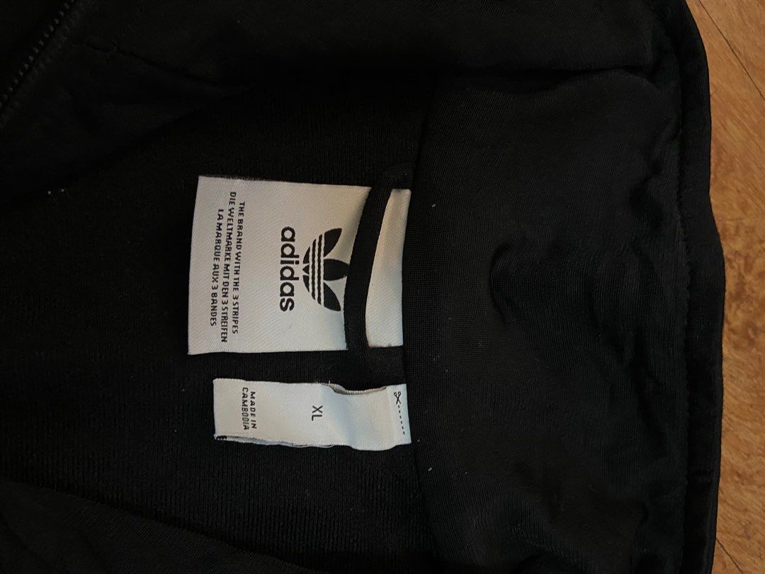 Black adidas tracksuit trefoil (Category: Sets & Coordinates) located in Manila. Submitted by kesaro (Listing ID 1266112640, Image 3). Description: Manila loc Details posted in pics.