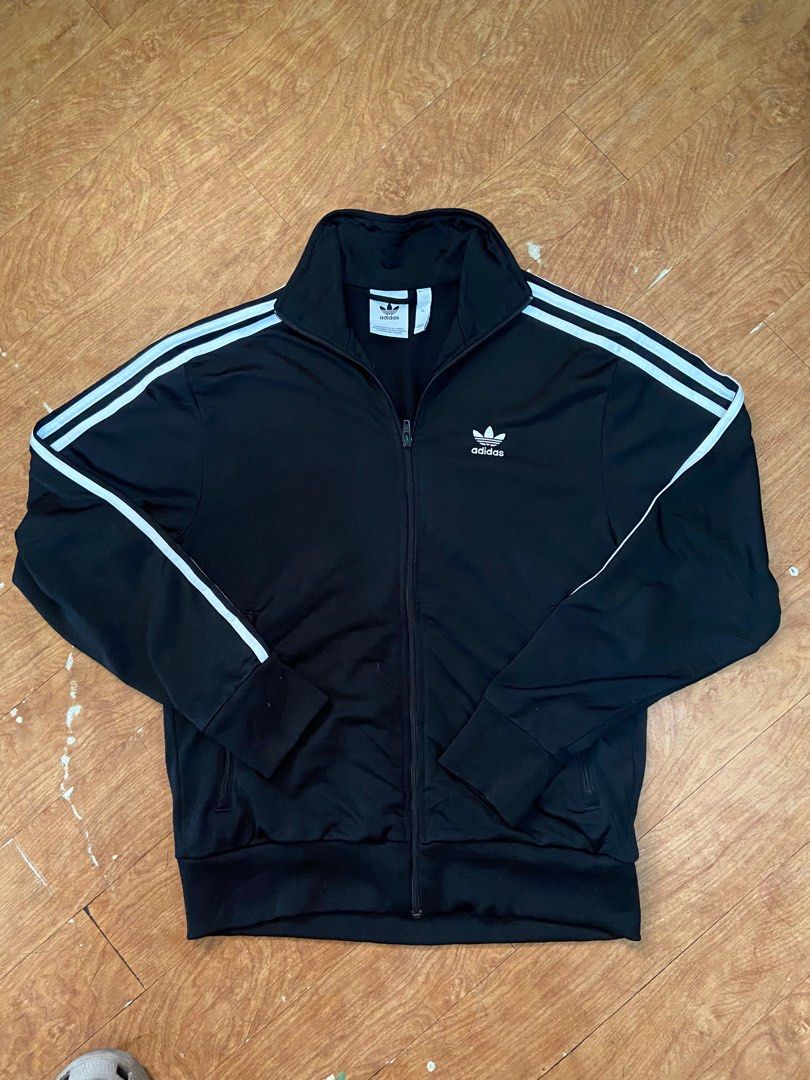 Black adidas tracksuit trefoil (Category: Sets & Coordinates) located in Manila. Submitted by kesaro (Listing ID 1266112640, Image 1). Description: Manila loc Details posted in pics.
