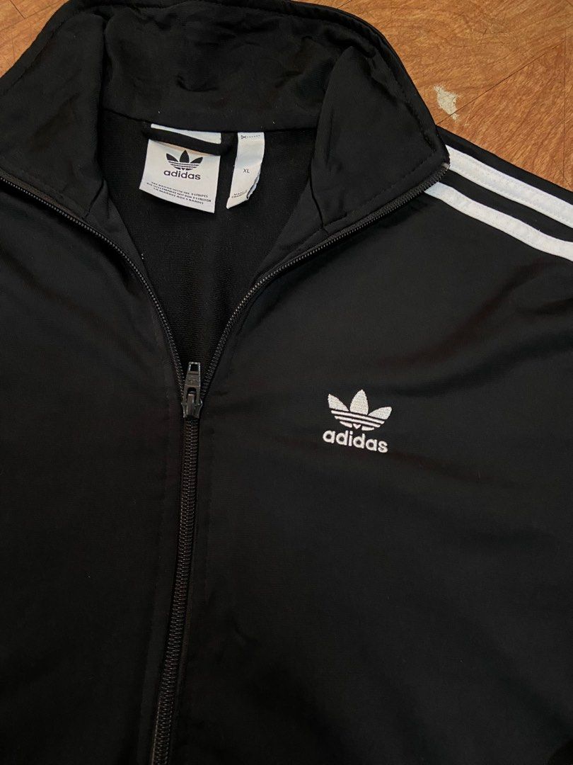 Black adidas tracksuit trefoil (Category: Sets & Coordinates) located in Manila. Submitted by kesaro (Listing ID 1266112640, Image 2). Description: Manila loc Details posted in pics.