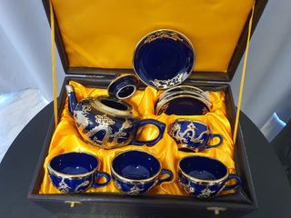 https://media.karousell.com/media/photos/products/2023/11/17/chinese_tea_set_with_gold_plat_1700201129_bbb1f39c_thumbnail.jpg