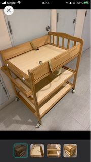 (Dismantled) Wooden baby changing station/ cot with wheels, loads of storage space 
