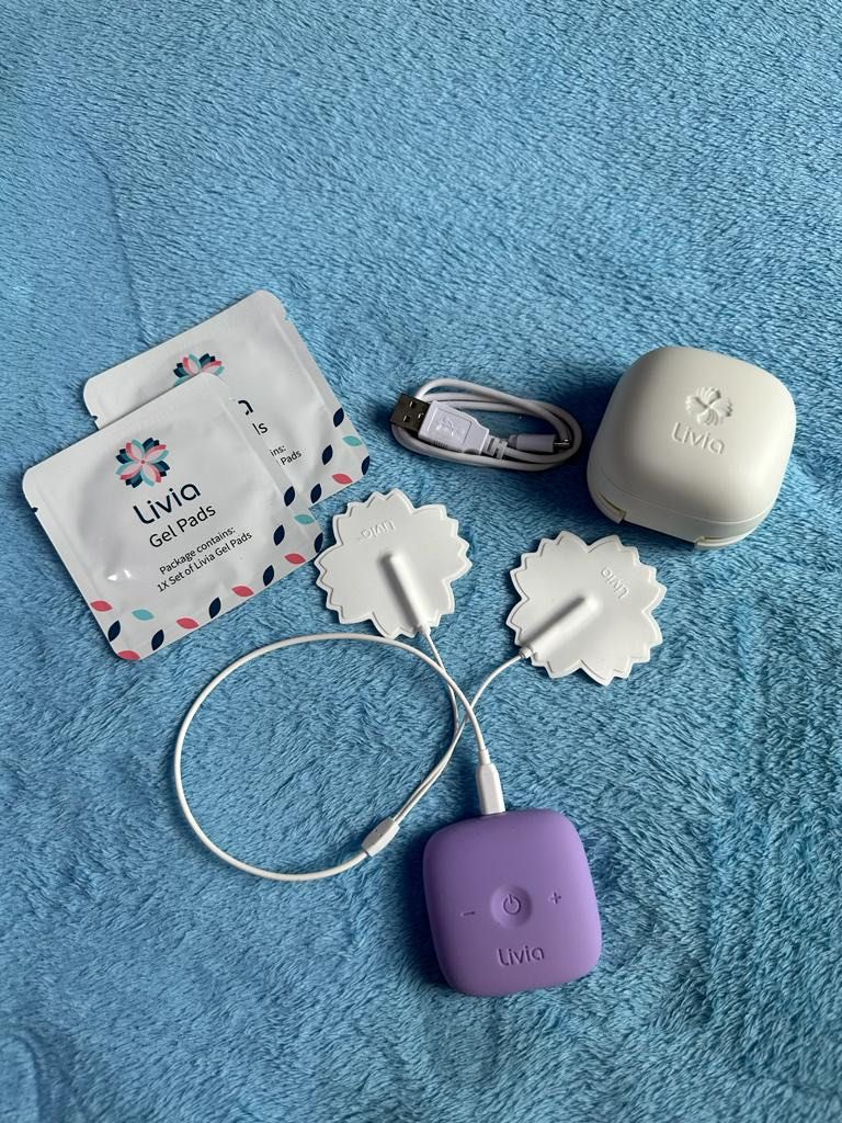 Livia period menstrual pain relief, Health & Nutrition, Massage Devices on Carousell