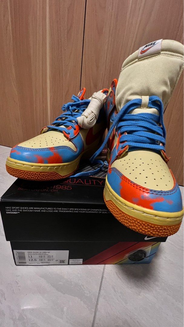 blue nike with orange swoosh