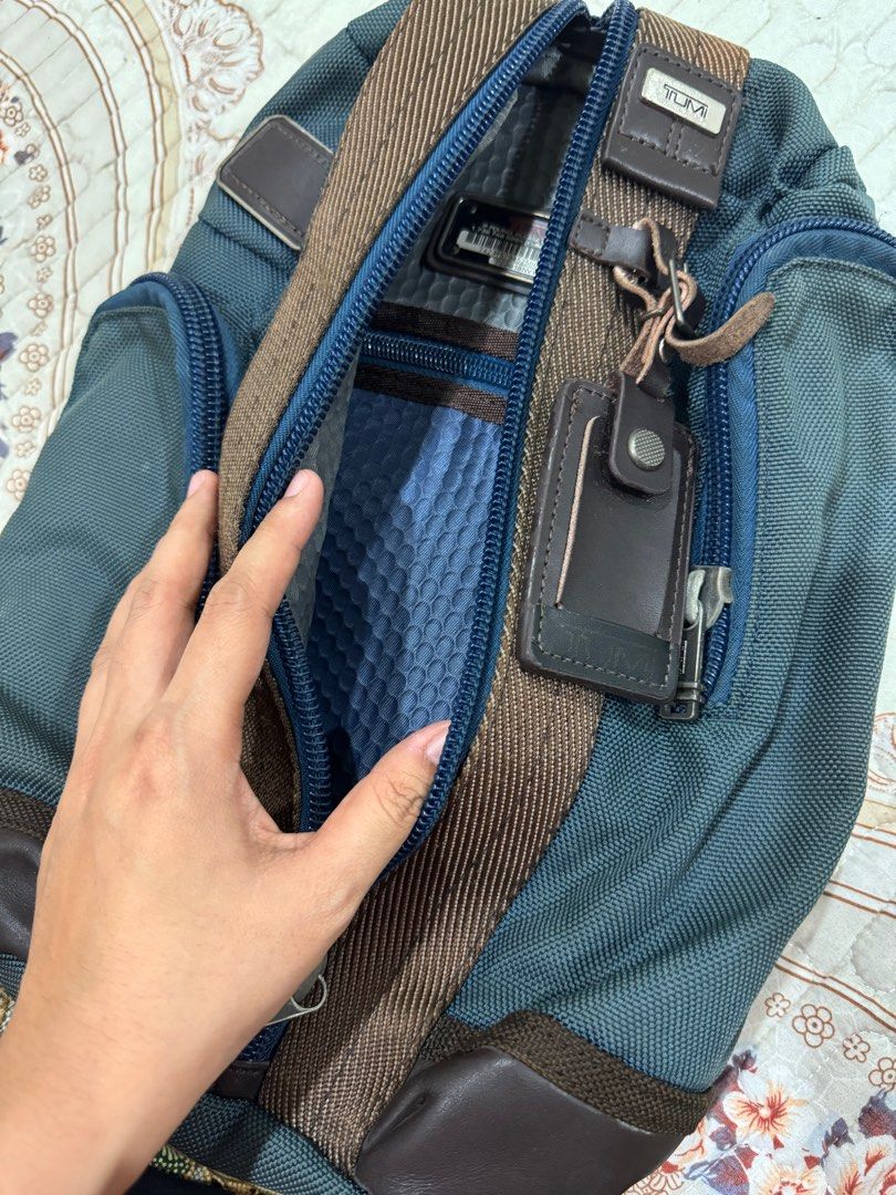 Tumi sling bag original sales