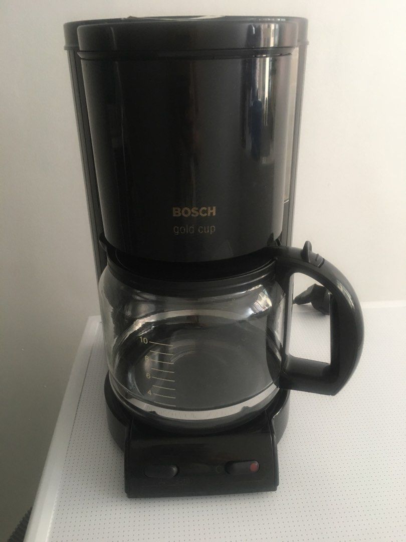 RUSH (Moving out) Bosch 10 cups Coffee Maker (Category: Coffee Machines & Makers) located in Manila. Submitted by leahfredborg (Listing ID 1266435302, Image 2). Description: •This coffee maker is perfect for home or office use and is manufactured in Germany. It is a filter coffee machine that can make up to 10 cups of delicious ground coffee. It includes features such as a removable filter basket and water tank which makes cleaning easy. The cup 