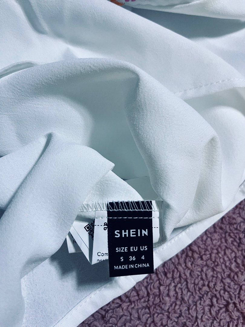 Brand new Shein white blouse (Category: Blouses) located in Pateros City. Submitted by marifernandez (Listing ID 1266282065, Image 3). Description: Brand new Shein White top Small size but can be fit up to large.