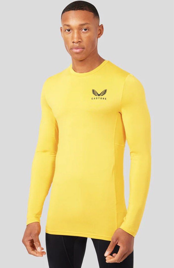 Castore Base layer Yellow Gold Large Men s Fashion Activewear on Carousell
