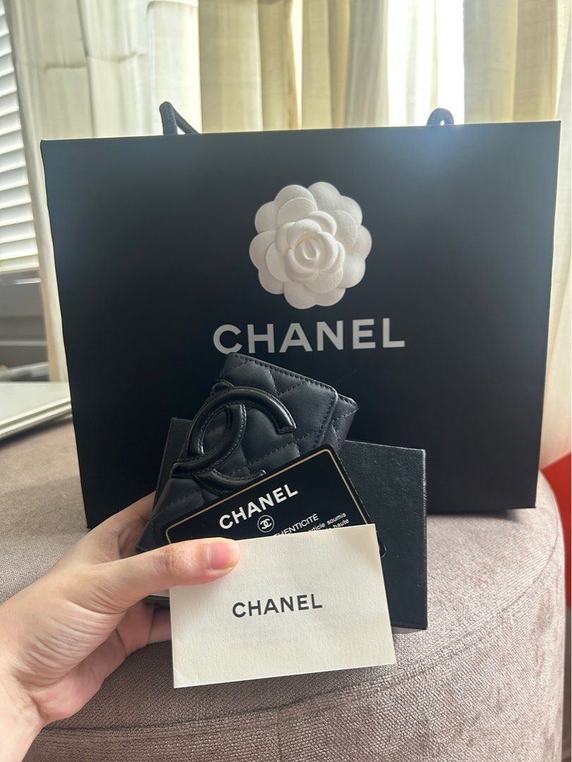 Chanel Cambon Key Holder (Category: Luxury Bags & Wallets) located in Makati City. Submitted by bargainmnl (Listing ID 1266264639, Image 1). Description: Item disclosure : kulang ng isang hook, normal signs of use(please check all photos)rank ab With one card slot Intact holo With Authenticity Card, box and paperbag.