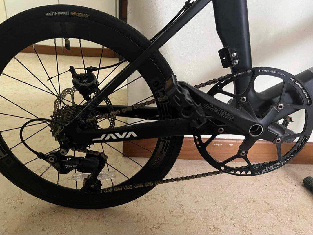 JAVA Bicycle (Category: Bicycles) located in Singapore. Submitted by oliviarodrigoooo (Listing ID 1266369037, Image 4). Description: Light weight Bought at 1800$ 1400 negotiable fast deal rfs moving out country 🚲Features -Full Carbon Frame and Seatpost -22 Speed Shimano 105 -Drop bar -9.9 kg 🚥Details: Frame: Carbon Fiber Fork: Carbon Fiber Seatpost: Carbon Fiber Saddle: Decaf Handlebar: Decaf drop bar Front Derailleur: Shimano 105 R7000 Rear De