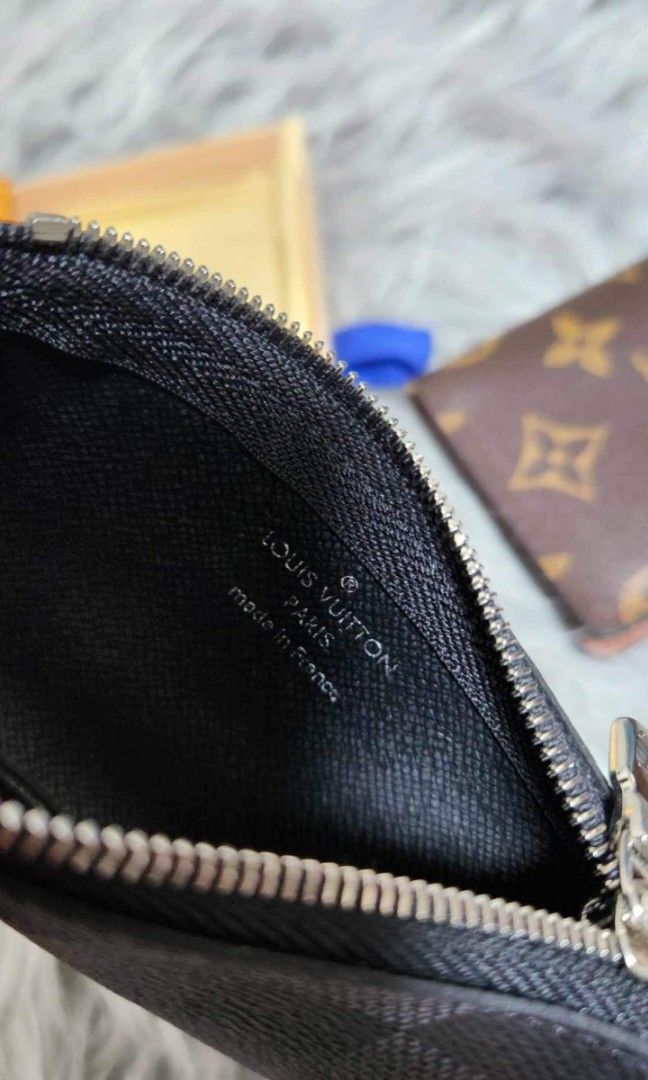 Louis Vuitton Coin Cles in Graphite (Category: Luxury Bags & Wallets) located in Quezon City. Submitted by ten.ten2504 (Listing ID 1266431401, Image 3). Description: Louis Vuitton Coin Cles in Graphite Condition: Unused Inclusion: Dust bag and box.