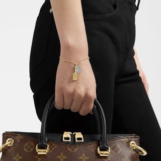 Shop Louis Vuitton Chain Links Bracelet (M00306) by トモポエム