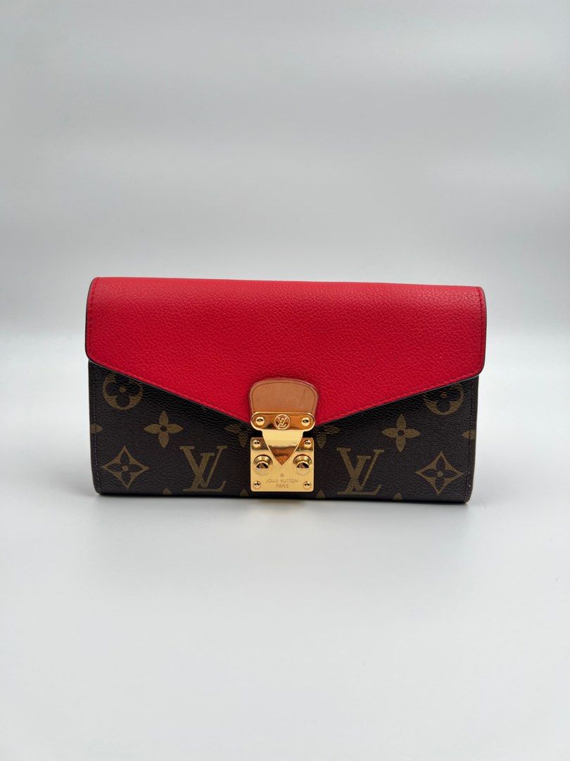 LV Wallet (Category: Luxury Bags & Wallets) located in Tarlac. Submitted by mysecretbliss (Listing ID 1266277365, Image 1). Description: AUTHENTIC, lightly used. personal wallet, you can attach chain to make it a WOC. RFS: decluttering.