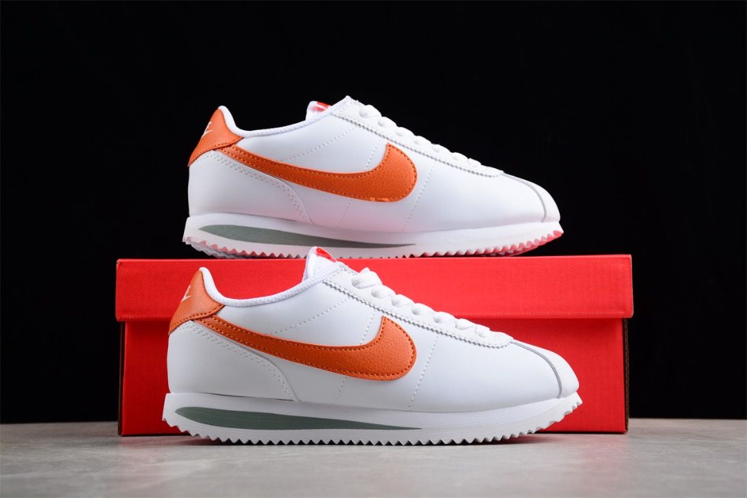 Nike cortez orange and white on sale