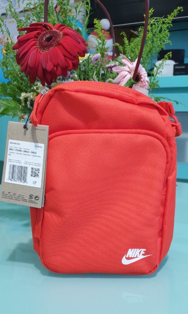 Nike sling bag red top