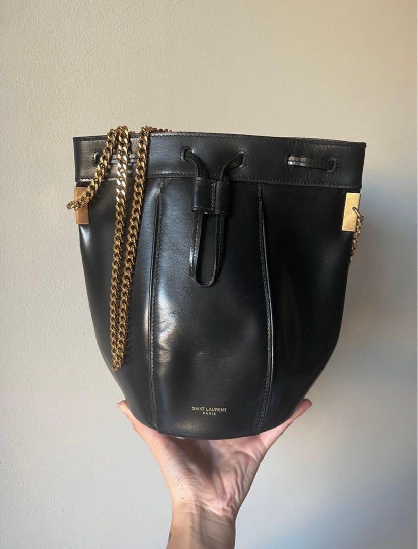 Saint Laurent Tabitha Bucket Bag (Category: Cross-body Bags) located in Taguig. Submitted by AVdeclutters (Listing ID 1266406971, Image 2). Description: Very pretty on-the-go bag by Saint Laurent / YSL 🤍 - 9/10 condition - clean interior w/ no foul smell; with hardly noticeable scratch on the exterior - comes with dust bag and authenticity card - comes with a FREE GIFT :) RFS: chain strap is too long; decluttering Price is slightly negotiable. S