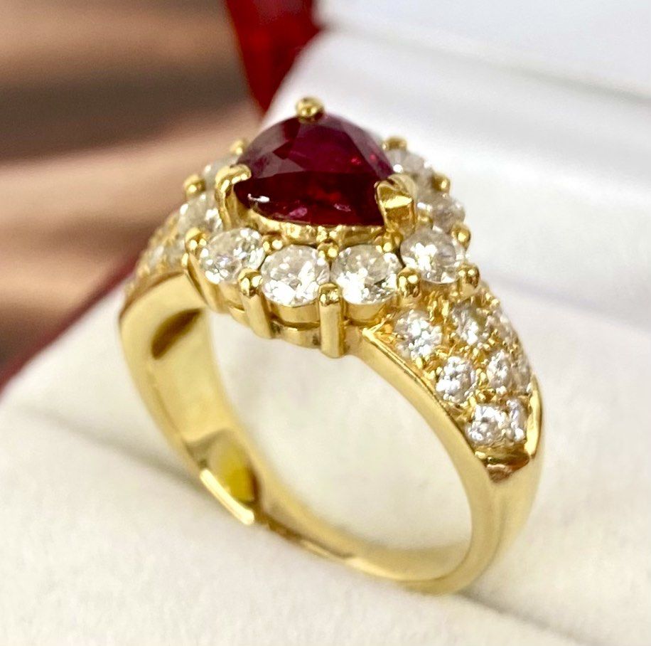 Gold ruby ring with cheap diamonds