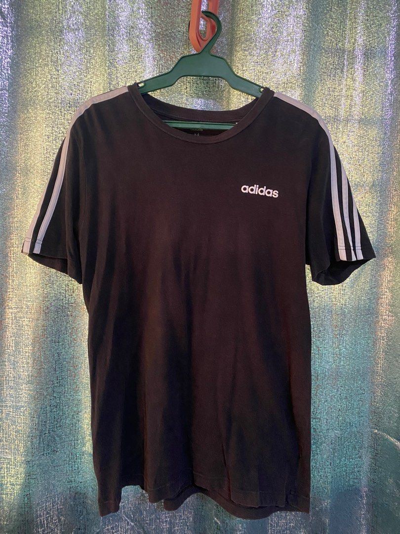Adidas Black T-shirt (Category: Tshirts & Polo Shirts ) located in Manila. Submitted by juliuz133 (Listing ID 1266572059, Image 1). Description: Lightly used Adidas shirt.