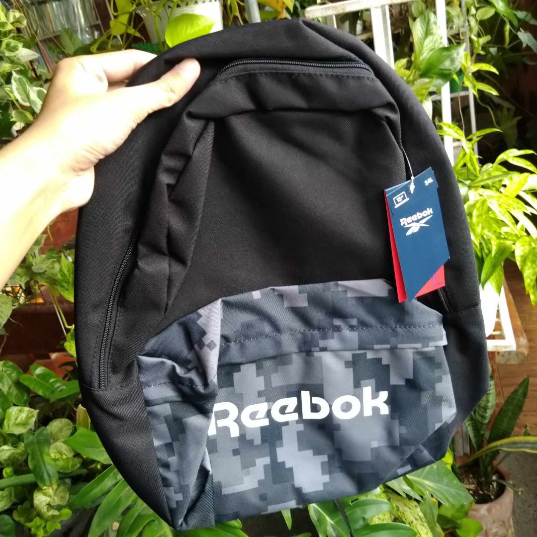 Black Bag | Reebok Backpack (13" Laptop) (Category: Backpacks) located in Calamba. Submitted by acecollections (Listing ID 1266559555, Image 1). Description: Black Bag | Reebok Backpack (13" Laptop) Price: P600 only Original Price: P1,695 A VERSATILE BACKPACK FOR YOUR ON-THE-GO LIFESTYLE, MADE WITH RECYCLED MATERIALS You love exploring the city you live in. With a big main compartment plus front and side pockets, this Reebok backpack keeps you or