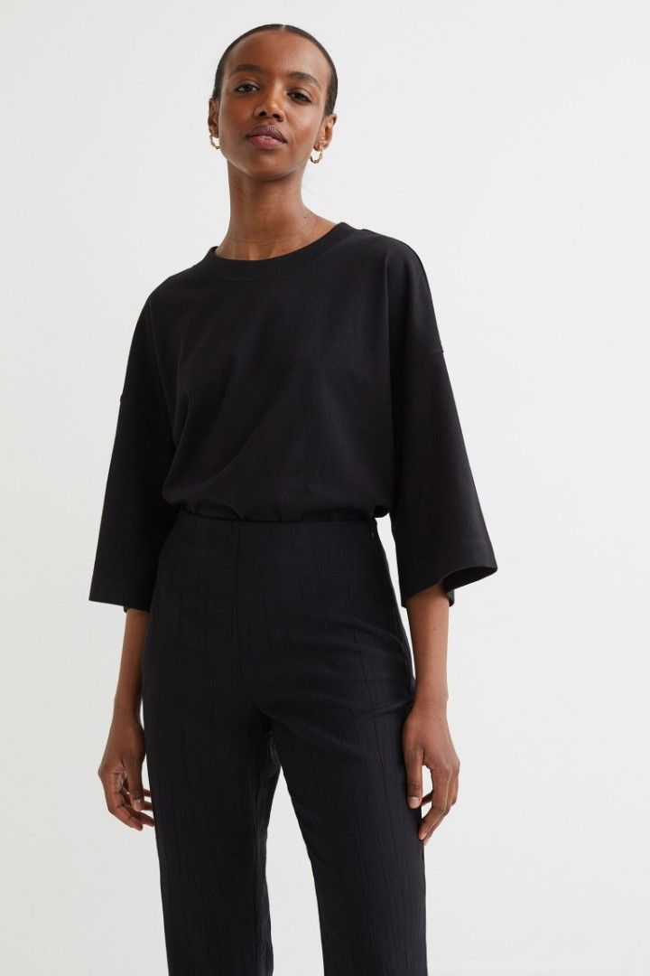 H&m black flared trousers sales