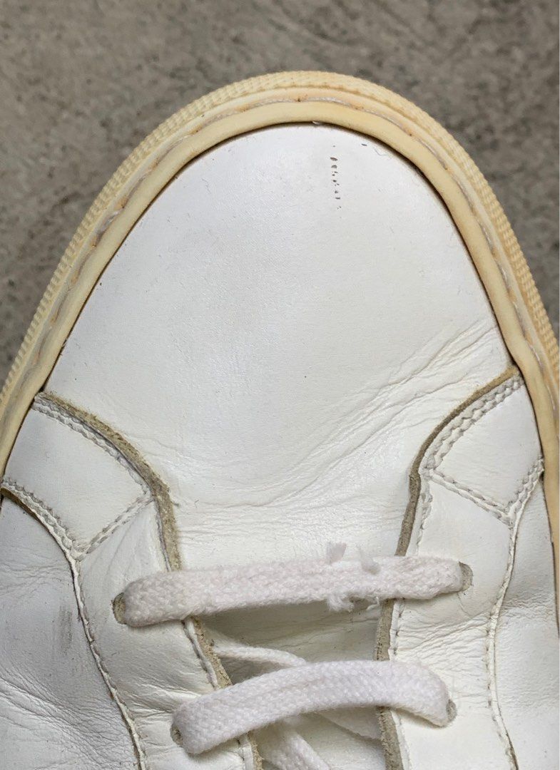 COMMON PROJECTS ACHILLES LOW (Category: Sneakers) located in Cavite. Submitted by ___layern0ne (Listing ID 1266531521, Image 2). Description: Size: 42 No inclusions | Pair only Please expect normal signs of wear and some flaws (yellowing sole, heel drags, creases, shallow scratches)| Still presentable | Requires cleaning.