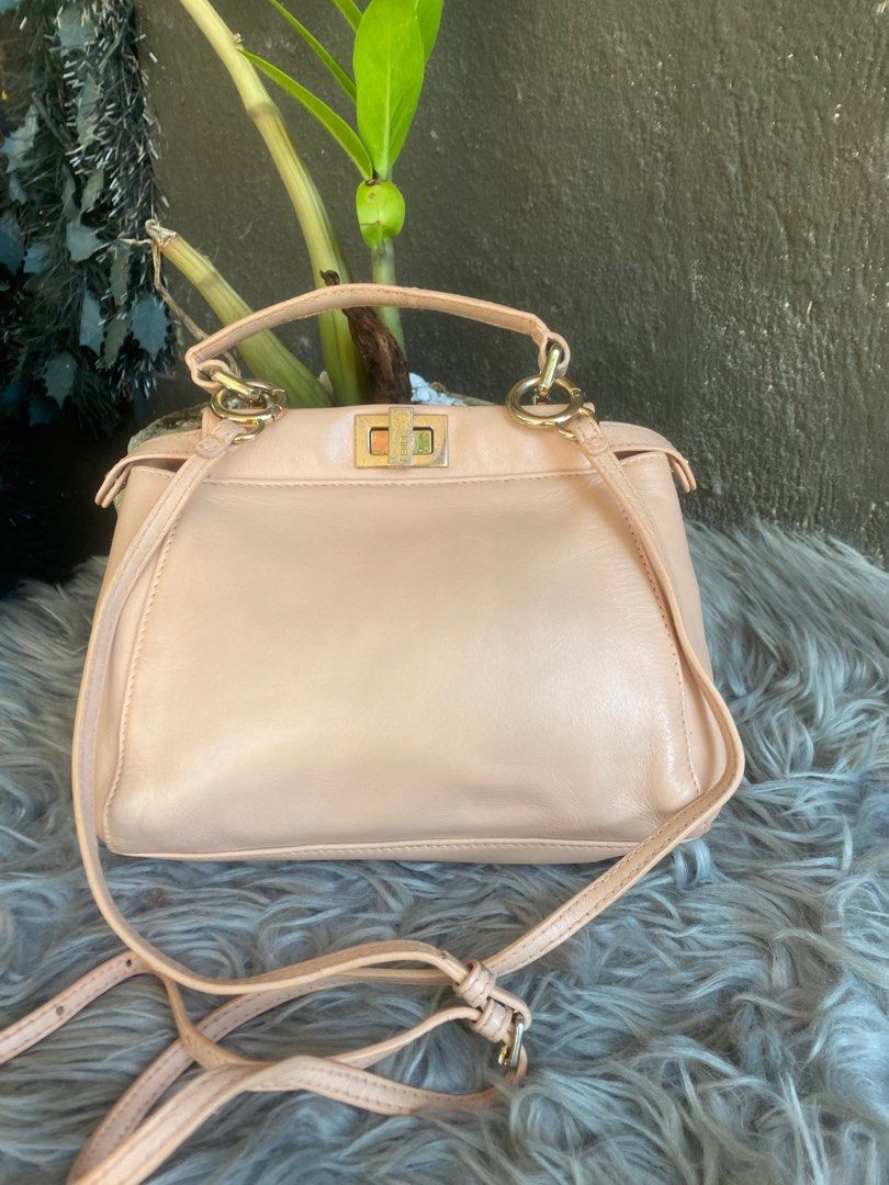 FRNDI PEEKABOO MINI ❤️ (Category: Luxury Bags & Wallets) located in Bacolod City. Submitted by chuchaystuffs (Listing ID 1266629579, Image 1). Description: Kayo na mgpacheck dkopa napapv lc comes with black tag ang Ganda pa so cute .