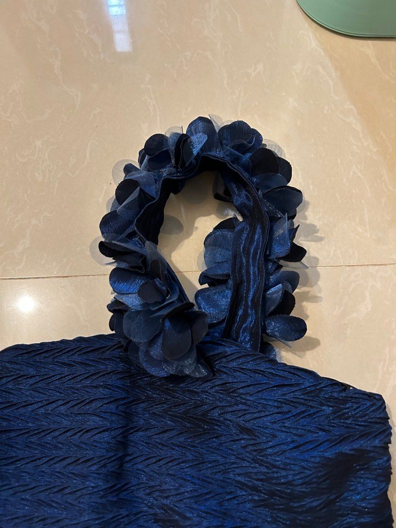 Metallic navy blue party dress (Category: Dresses) located in Paranaque City. Submitted by mayegal (Listing ID 1266518519, Image 3). Description: Never worn. Still with tag. Length: 32inches MOP: Gcash Shipping: Gogo express.