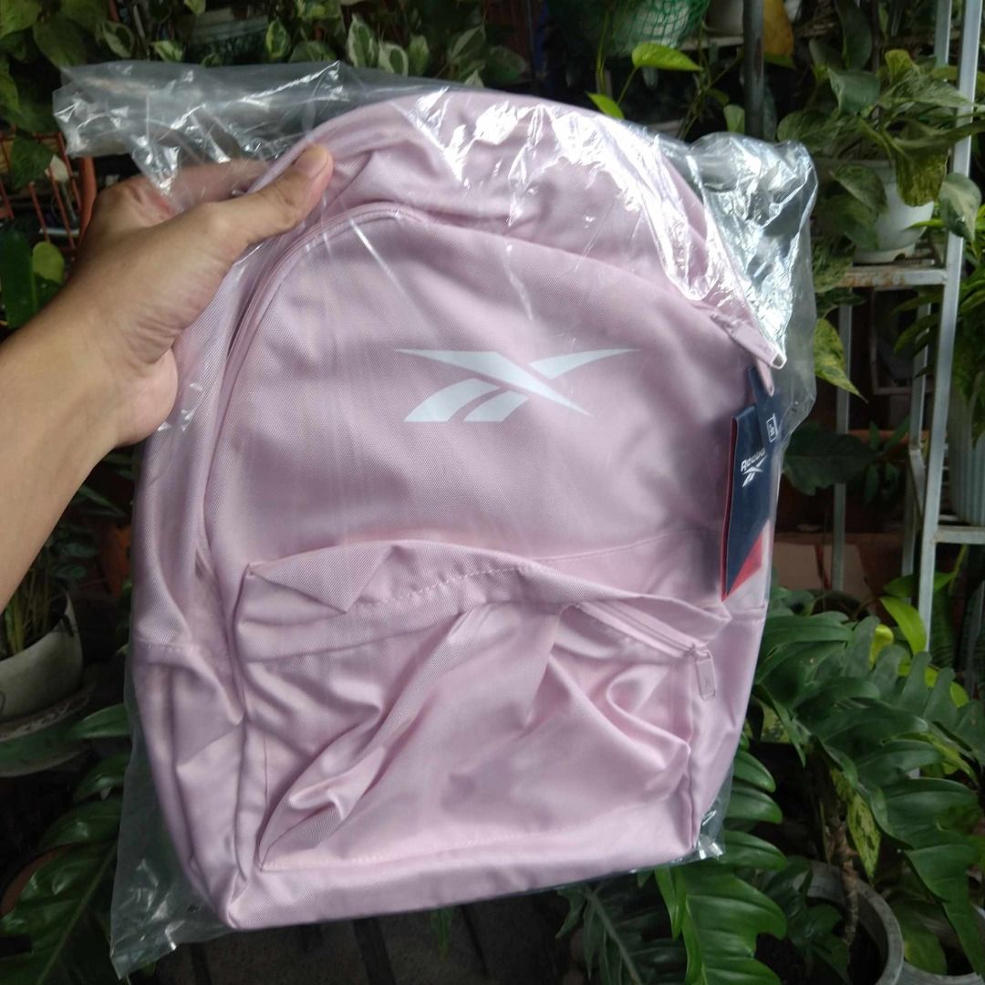 Pink Bag | Reebok Backpack (15" Laptop) (Category: Backpacks) located in Calamba. Submitted by acecollections (Listing ID 1266554044, Image 1). Description: Pink Bag | Reebok Backpack (15" Laptop) Price: P800 only Original Price: P2,095 A CLASSIC EVERYDAY BACKPACK MADE WITH RECYCLED MATERIALS Show your love for classic good looks with this Reebok backpack tossed over your shoulder. Beyond the clean style, it has plenty of pockets to keep your stu