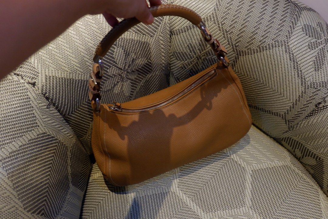 Prada Belted Zip Shoulder Bag (Category: Luxury Bags & Wallets) located in Iloilo. Submitted by chringgg (Listing ID 1266549973, Image 2). Description: •excellent condition •no cracks, no tarnish on hardware :) flaw: konting signs of usage sa handle •comes with dustbag & cards •sold $730 online. selling only 17000!! 9” handle drop 13”W x 7.5”H x 3.5”D.