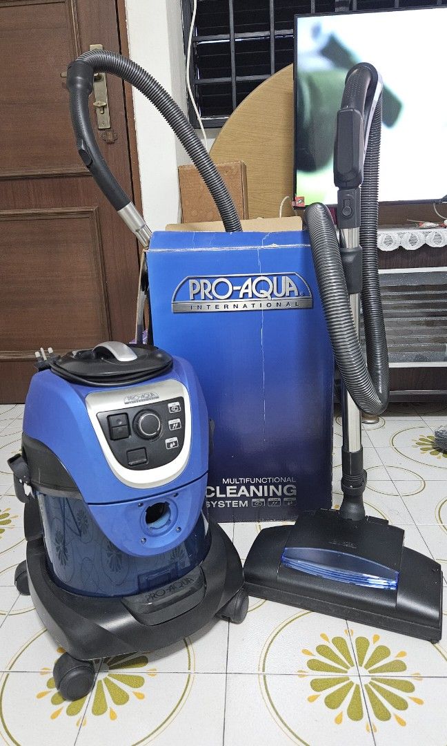 ProAqua vacuum cleaner use water & comes with many attachments, TV