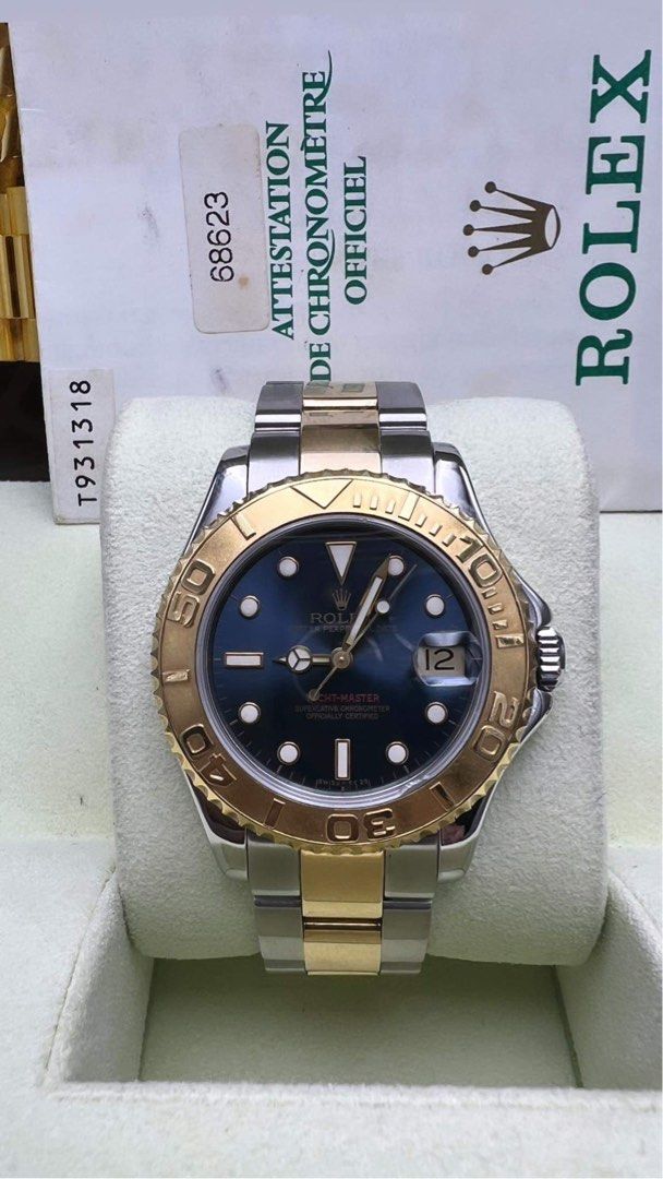 ROLEX 2000 Yacht Master Blue face two toned 35mm (Category: Luxury Watches) located in Pasig City. Submitted by Watchaholics (Listing ID 1266583863, Image 1). Description: ROLEX 2000 Yacht Master Blue face two toned 35mm -Ref 68623 -Year model 2000 -9/10 condition -with orig box and cert For 495k You may DM or contact @ 09615077138 Thanks admin😉.