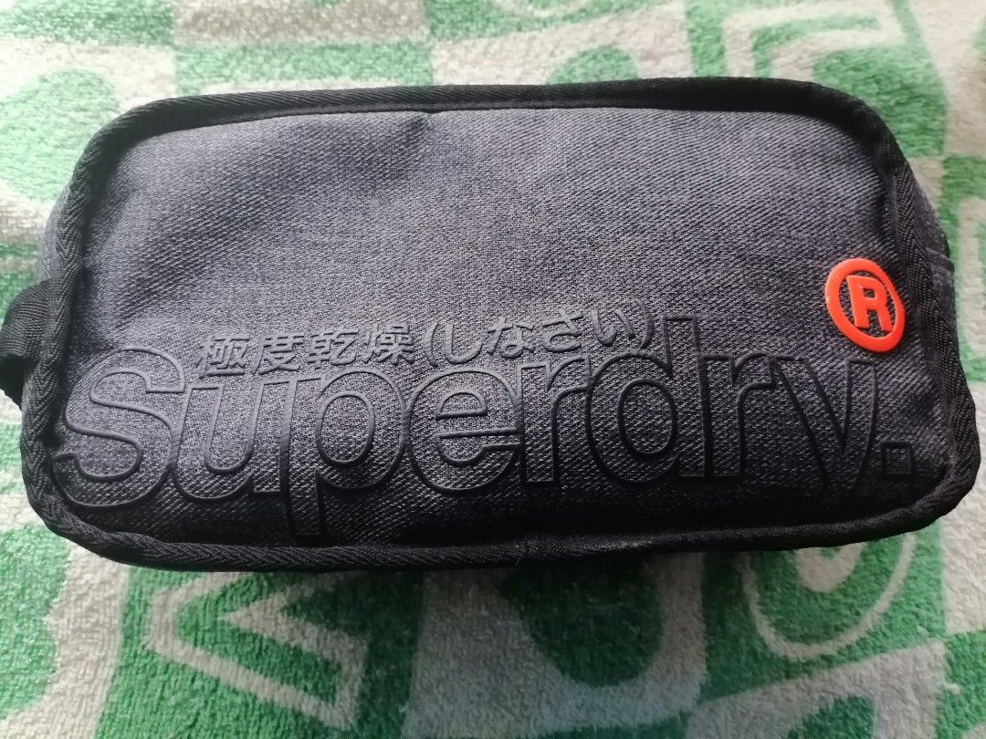 Superdry clutch bag on sale