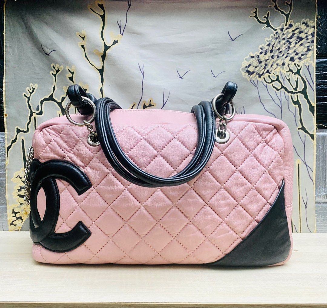 Pink and 2025 black chanel bag