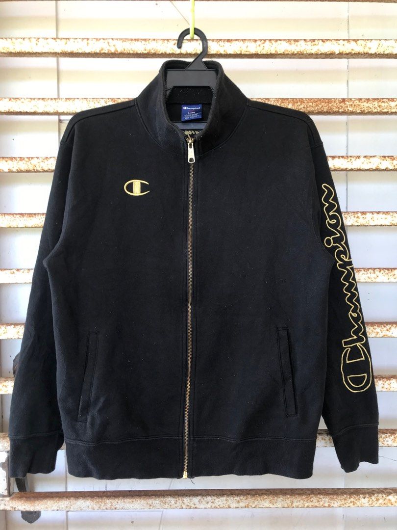 Black champion hoodie with gold logo store