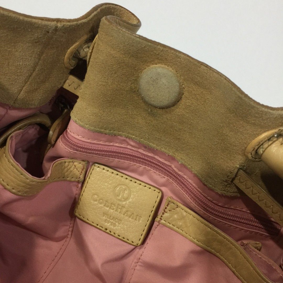 COLE HAAN Leather Braid Handle Bag (Category: Luxury Bags & Wallets) located in Quezon City. Submitted by pleasehelpmedeclutter (Listing ID 1263524043, Image 2). Description: • authentic • no inclusion • preloved (please manage your expectations) • open for meetup (faster and safer transaction).