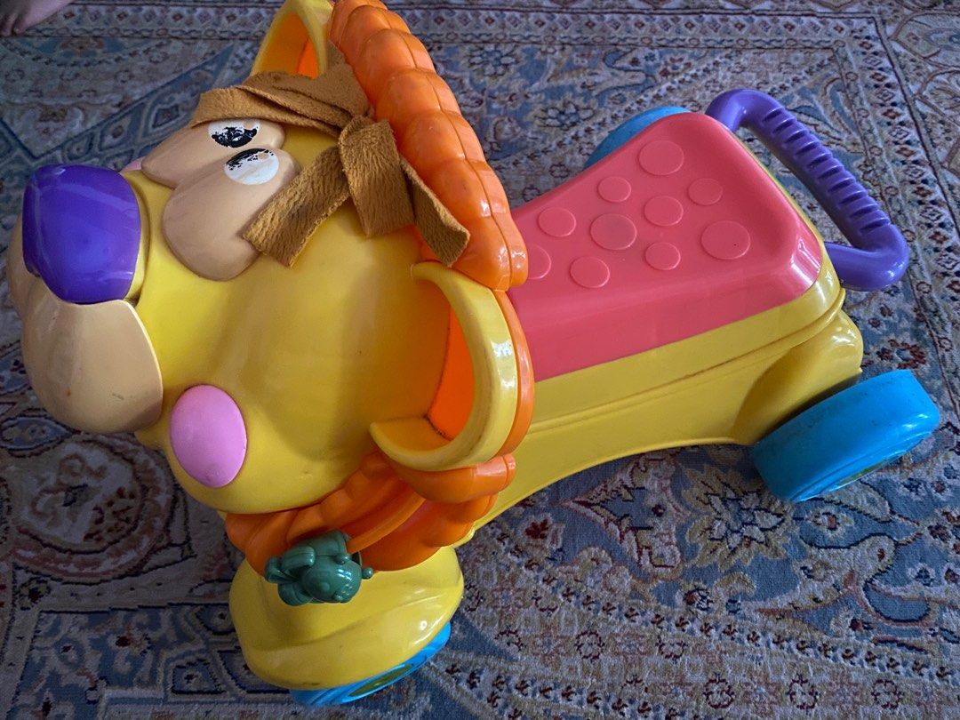 Porteur lion fisher price store