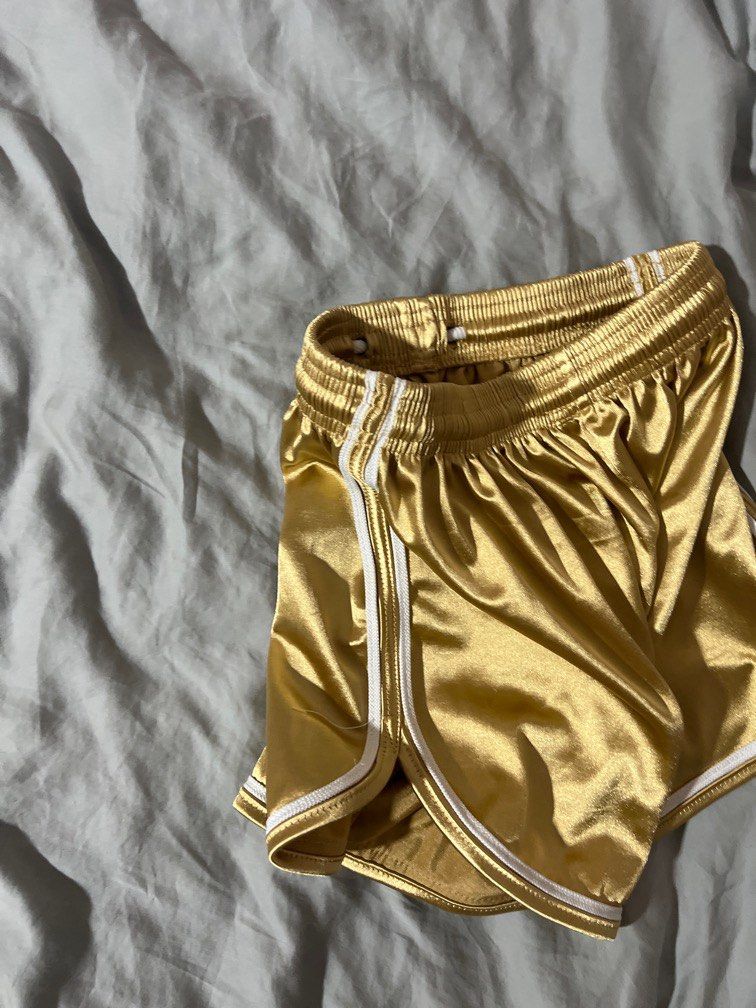 Gold shorts, Women's Fashion, Bottoms, Shorts on Carousell