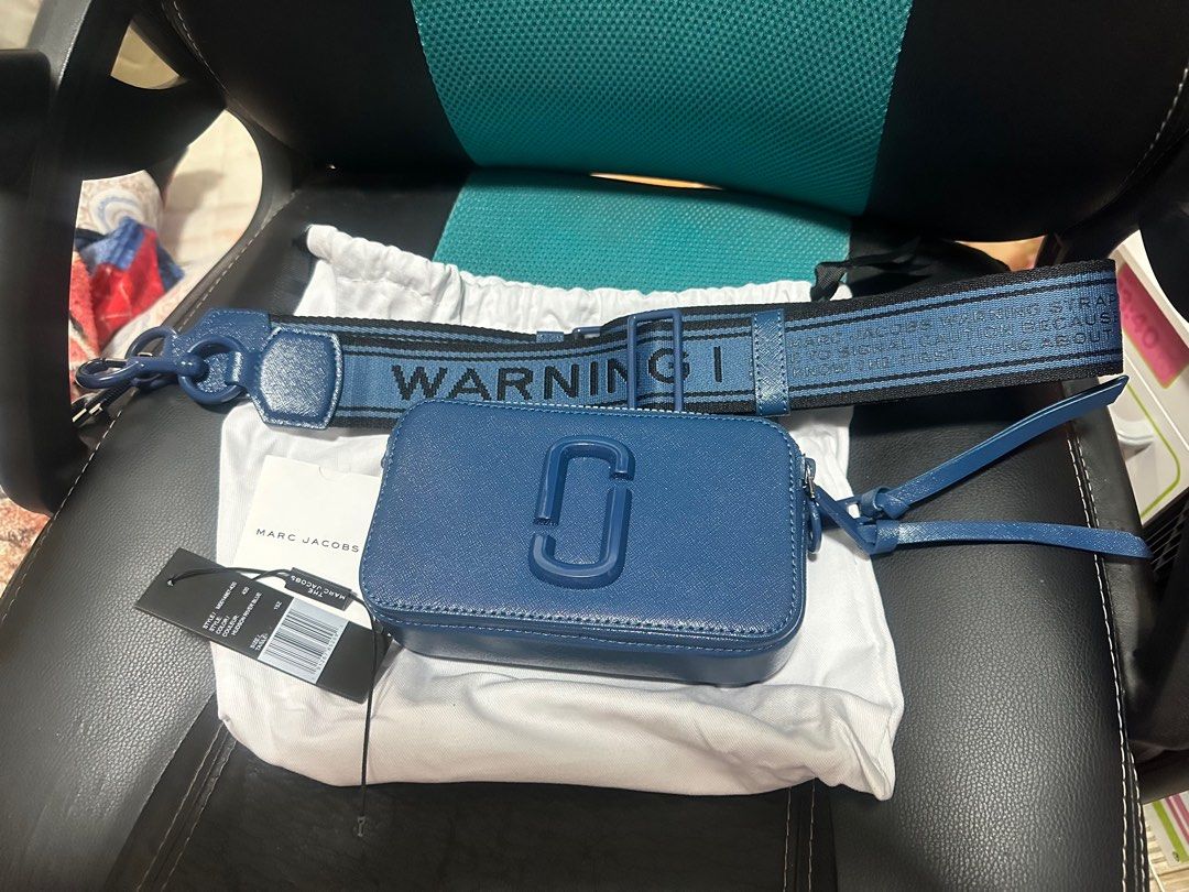 Marc Jacobs Snapshot (Category: Luxury Bags & Wallets) located in Cainta. Submitted by affordavisse (Listing ID 1263459522, Image 1). Description: Pre-loved Marc Jacobs Snapshot Hudson Blue with dustbag minimal flaw. yung hardware konting fade. seldom used nasa 4x lang siguro; not fan of small bags siguro. ☺️.