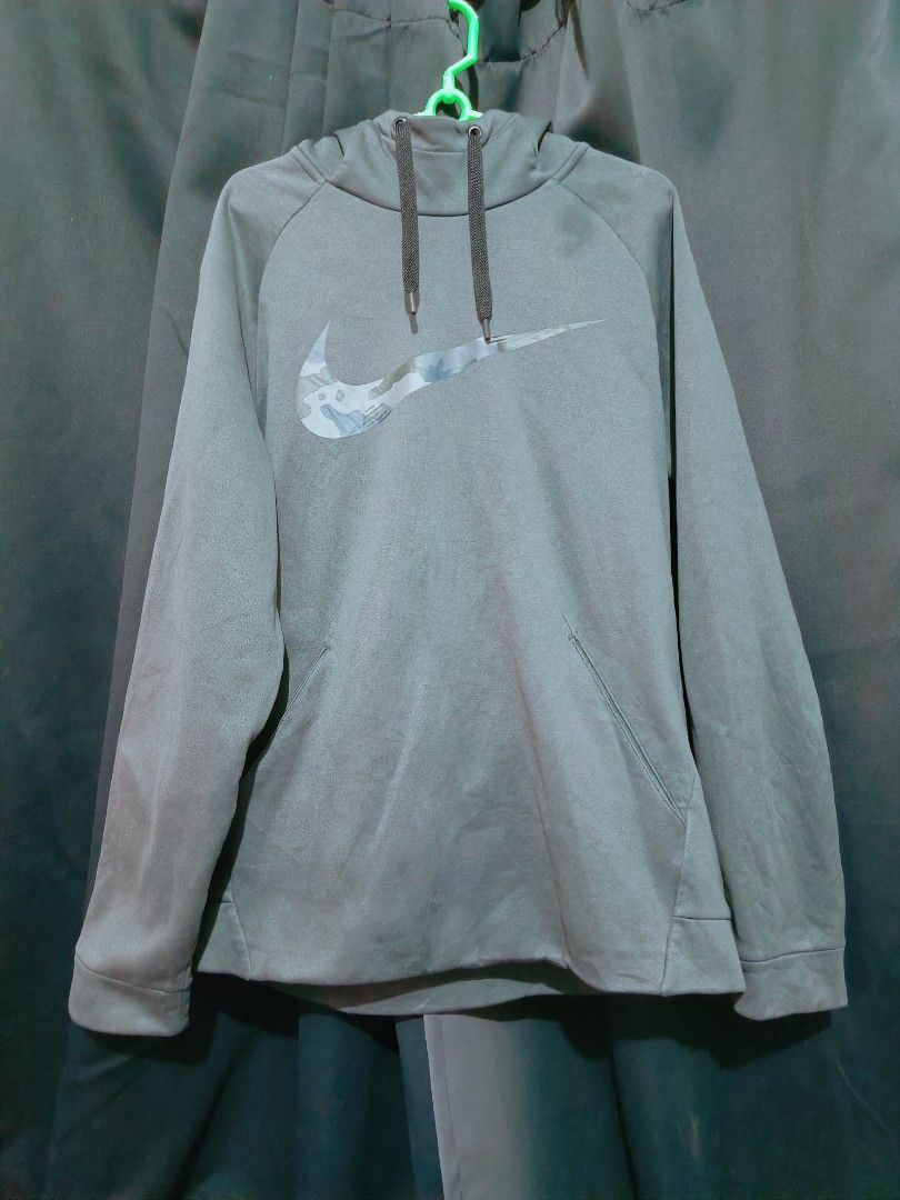 Nike Drifit Hoodie Jacket (Category: Hoodies) located in Cainta. Submitted by sadnote (Listing ID 1263488041, Image 2). Description: Nike Drifit Hoodie Jacket Dark Grey color Dimes: W- 22 L- 27.5 No issue // Excellent Condition Color rate: 10/10 Location: Cainta Can do shipping via LBC or Lalamove Shopee checkout (Payment first).