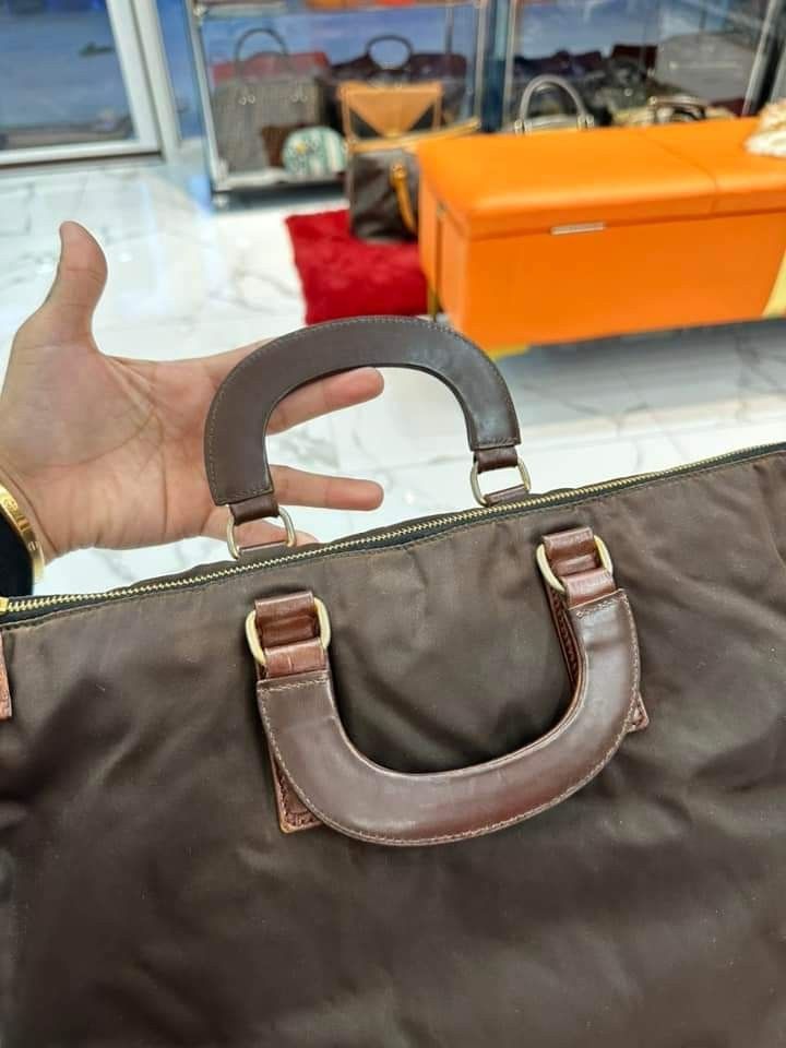 Orig Prada documents bag (Category: Luxury Bags & Wallets) located in Davao. Submitted by luxben (Listing ID 1263482852, Image 3). Description: 🅿️12,980 lp plus sf Orig Prada documents bag Kasya laptop 15 inches Nylon and leather W replacement leather strap Rank A to ab.