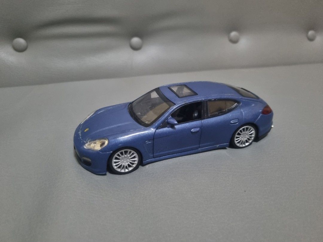 Porsche Panamera by Petron 1:32 (Category: Vehicle & Diecast Models) located in Silang. Submitted by samflores2k4t7 (Listing ID 1263401637, Image 3). Description: For sale Porsche Panamera by Petron Scale 1/32 6 inches lenght Electronic working tested medyo pundido lng d right headlight Issue With paintchip and scratches s may hood at front bumper Crack s windshield see pics No box.