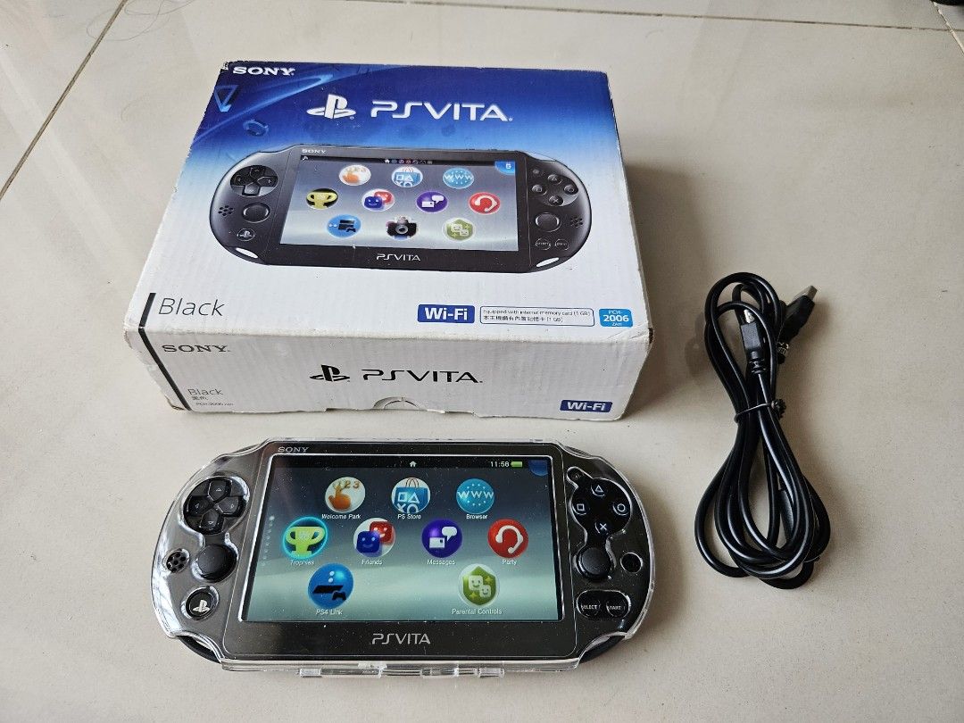 PlayStation Vita Slim in Black with 128GB Memory Card like new