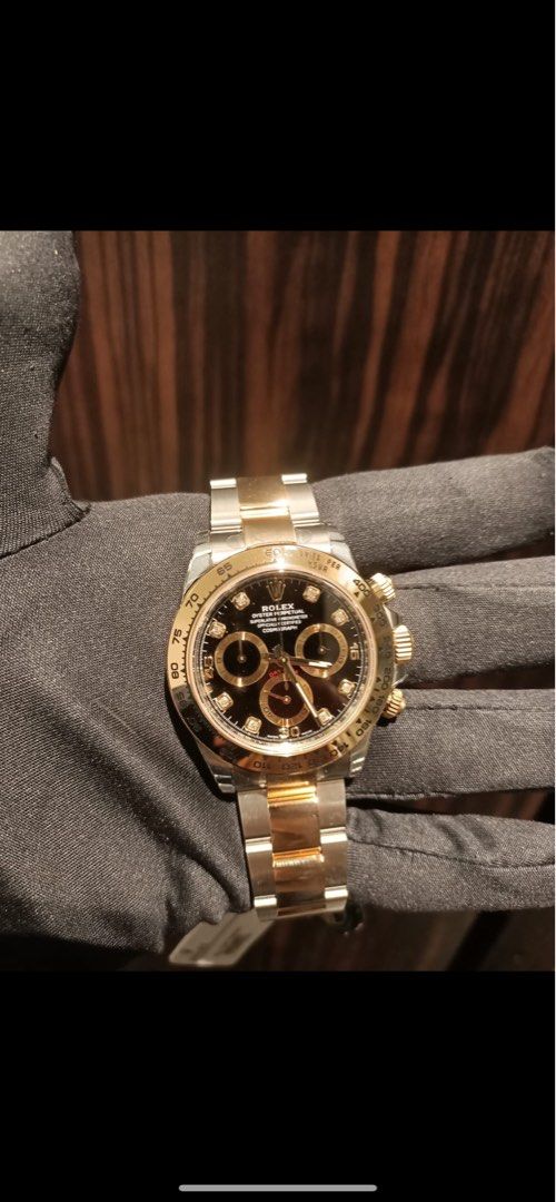 rolex daytona gold 2022