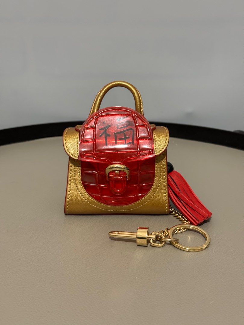 Delvaux bag sale charm