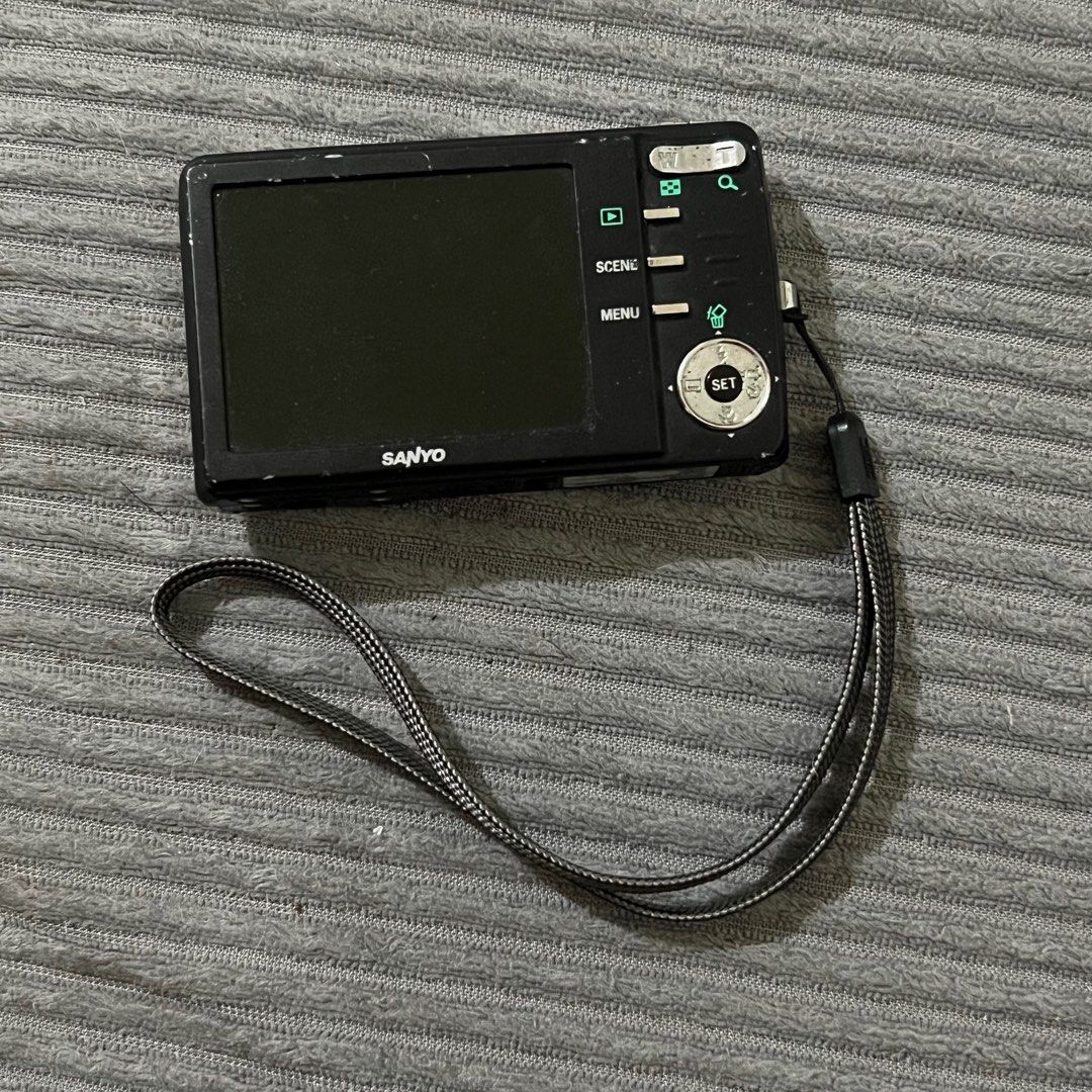 Sanyo DSC-X1260 Digital Camera (Category: Cameras) located in Caloocan City. Submitted by joezenrhasie (Listing ID 1263457032, Image 3). Description: -Working (Hindi lang nag fofocus need ipa-repair) -naka japanese language -With Original Charger -With Original Battery -Without SD card NO SAMPLE PIC rfs: decluttering .