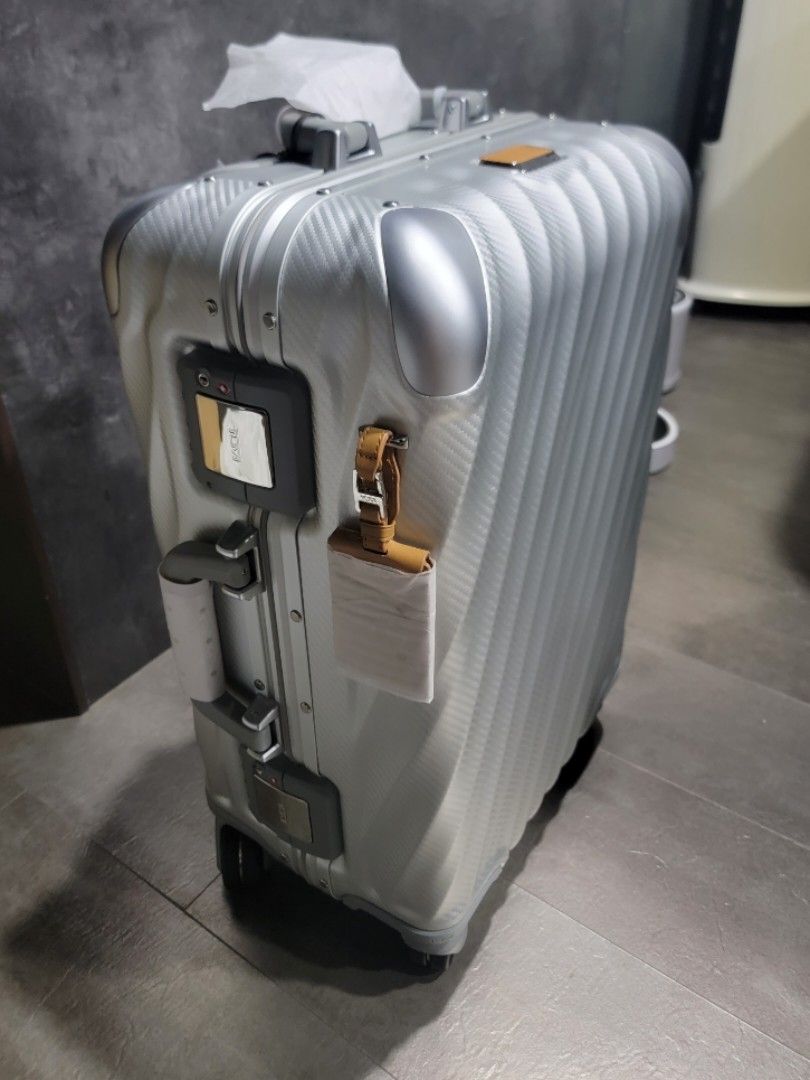 Tumi rimowa hot sale