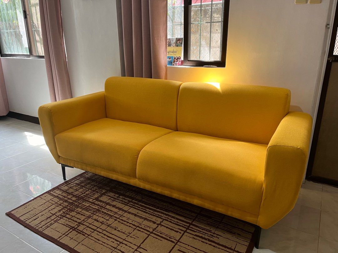 3 to 4 seater yellow sofa New (Category: Sofas) located in Las Pinas. Submitted by abby_e_g (Listing ID 1266742942, Image 2). Description: 75 inches Long x 28 inches Wide Uratex Foam Half sack fabric cover Steel legs Original Price at ₱22K.