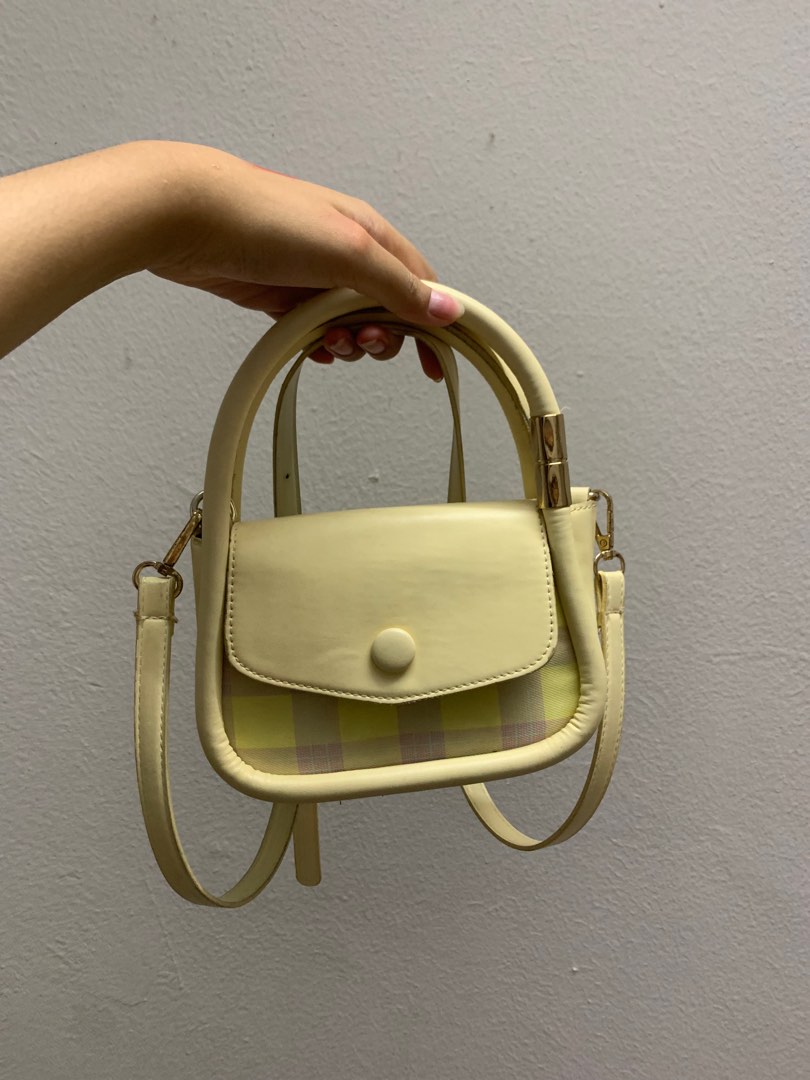 Pastel yellow handbag store