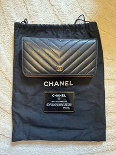 Used authentic original Chanel women's wallet Camellia flower embossed  leather black, Luxury, Bags & Wallets on Carousell
