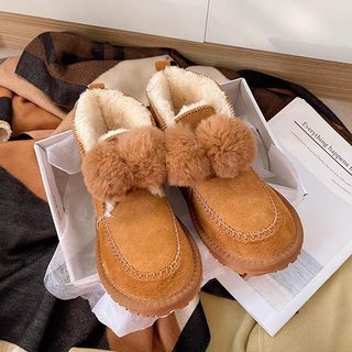 Uggs boots with fur balls cheap